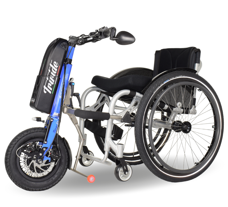 trui=ride power add-on attached to a manual wheelchair for improved mobility