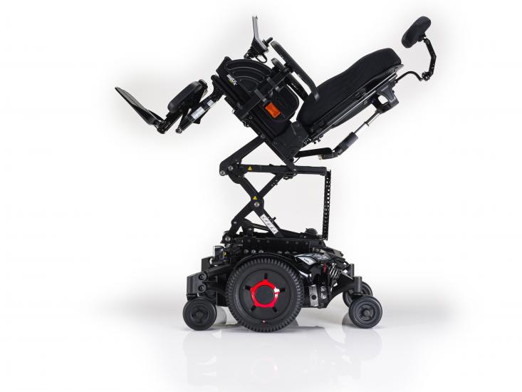 invacare TDX SP2 NB power chair side view in elevated and reclined position